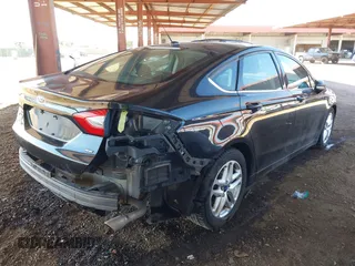 2015 Ford Fusion SE with VIN 3FA6P0H78FR306661, listed as a IAAI auction lot 41642086 with 158,349 mi miles. Bid and sale history available at carsss.com. Image 4.