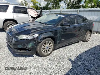 2017 Ford Fusion Hybrid S с VIN 3FA6P0UU2HR400677, выставлен на аукционе Copart как лот 60529985 с пробегом 106 950 миль миль и Списание • Salvage title. История ставок и продаж доступна на DreamBid. Изображение 1.
