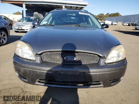 2005 Ford Taurus z VIN 1FAHP59U15A158162, wystawiony jako Copart lot #81109994 z przebiegiem 81 196 mil mil oraz Czysty tytuł • Clean title. Historia ofert i sprzedaży dostępna na DreamBid. Obrazek 5.