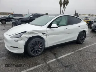 2023 Tesla Model Y Performance with VIN 7SAYGDEF1PF809654, listed as a Copart auction lot 43981915 with 16,401 mi miles and Salvage Title. Bid and sale history available at DreamBid. Image 1.