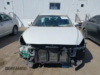2014 Mazda 3 i Touring with VIN JM1BM1L75E1100432, listed as a IAAI auction lot 41897584 with 149,628 mi miles and . Bid and sale history available at DreamBid. Image 13.