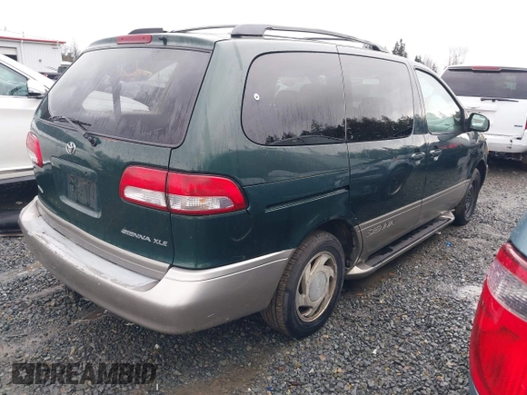 2001 Toyota Sienna LE with VIN 4T3ZF13C91U352296, listed as a IAAI auction lot 41647762 with 262,803 mi miles. Bid and sale history available at carsss.com. Image 4.