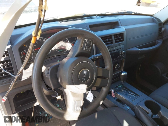 2012 Jeep Liberty Sport with VIN 1C4PJLAK7CW213834, listed as a IAAI auction lot 41353723 with 220,371 mi miles and . Bid and sale history available at DreamBid. Image 13.