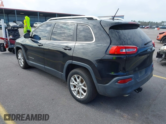 2014 Jeep Cherokee Latitude with VIN 1C4PJLCB0EW288309, listed as a IAAI auction lot 41624746 with 164,037 mi miles and . Bid and sale history available at DreamBid. Image 3.