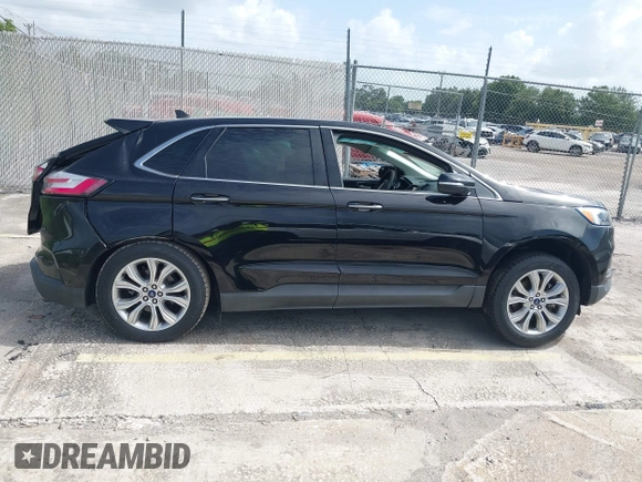 2020 Ford Edge Titanium with VIN 2FMPK4K93LBA05221, listed as a IAAI auction lot 42497787 with Not provided miles and . Bid and sale history available at DreamBid. Image 12.