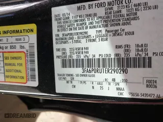 2014 Ford Fusion Titanium Hybrid with VIN 3FA6P0RU1ER290290, listed as a IAAI auction lot 41671735 with 207,405 mi miles. Bid and sale history available at carsss.com. Image 9.
