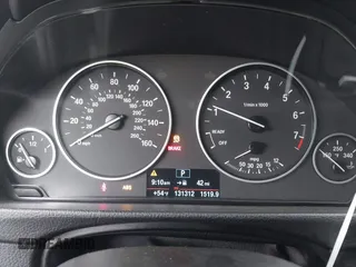 2014 BMW 3 Series 320i with VIN WBA3B1C59EK130839, listed as a IAAI auction lot 41225364 with 131,312 mi miles. Bid and sale history available at carsss.com. Image 7.