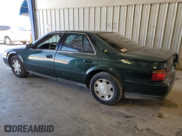 1999 Cadillac Seville Luxury SLS z VIN 1G6KS54Y5XU920020, wystawiony jako Copart lot #53956115 z przebiegiem 104 096 mil mil oraz Czysty tytuł • Clean title. Historia ofert i sprzedaży dostępna na DreamBid. Obrazek 2.