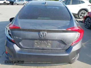 2017 Honda Civic EX z VIN 19XFC2F7XHE056273, wystawiony jako IAAI lot #42087934 z przebiegiem 95 871 mil mil oraz . Historia ofert i sprzedaży dostępna na DreamBid. Obrazek 17.