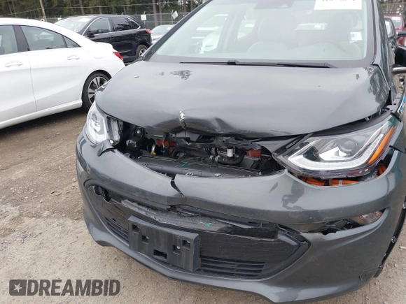 2021 Chevrolet Bolt EV LT z VIN 1G1FY6S0XM4108670, wystawiony jako IAAI lot #41625671 z przebiegiem 20 859 mil mil oraz . Historia ofert i sprzedaży dostępna na DreamBid. Obrazek 6.