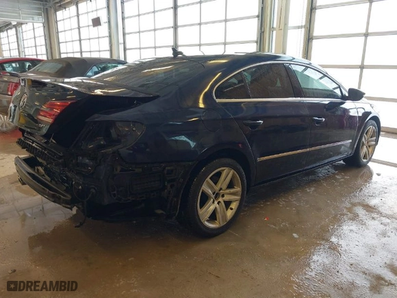 2013 Volkswagen CC Sport with VIN WVWBN7ANXDE515691, listed as a IAAI auction lot 41598295 with 104,461 mi miles. Bid and sale history available at carsss.com. Image 4.