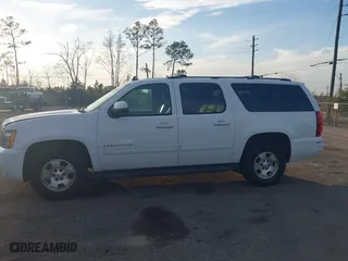2012 Chevrolet Suburban LT with VIN 1GNSCJE06CR226677, listed as a IAAI auction lot 41403380 with 199,213 mi miles. Bid and sale history available at carsss.com. Image 14.