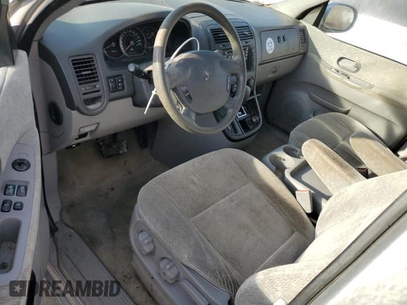 2005 Kia Sedona LX with VIN KNDUP132356769452, listed as a Copart auction lot 82835494 with 93,845 mi miles and Salvage Title. Bid and sale history available at carsss.com. Image 8.