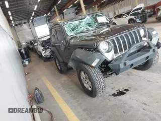 2020 Jeep Wrangler Willys z VIN 1C4GJXAG4LW237057, wystawiony jako IAAI lot #42044223 z przebiegiem 54 802 mil mil oraz . Historia ofert i sprzedaży dostępna na DreamBid. Obrazek 1.