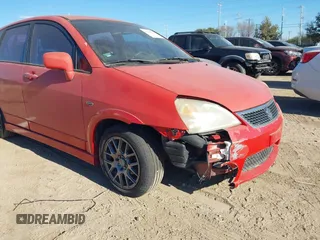 2006 Suzuki Aerio SX z VIN JS2RC61H965350850, wystawiony jako IAAI lot #41406615 z przebiegiem 169 983 mil mil oraz . Historia ofert i sprzedaży dostępna na DreamBid. Obrazek 6.