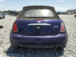 2005 MINI Convertible z VIN WMWRF33435TF61157, wystawiony jako Copart lot #54304905 z przebiegiem Nie podano mil oraz Szkoda całkowita • Salvage title. Historia ofert i sprzedaży dostępna na DreamBid. Obrazek 6.