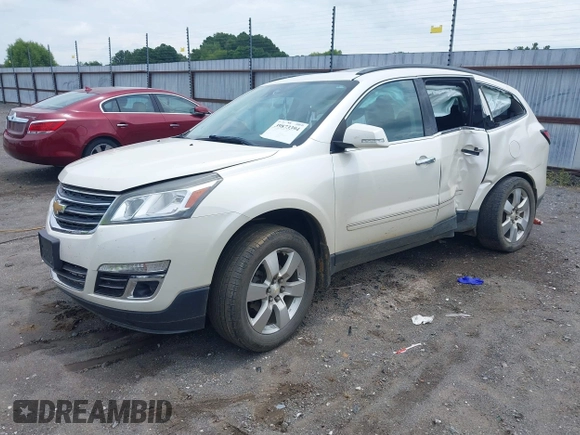 2014 Chevrolet Traverse LTZ with VIN 1GNKRJKD2EJ287211, listed as a IAAI auction lot 39873394 with 128,355 mi miles and . Bid and sale history available at DreamBid. Image 2.