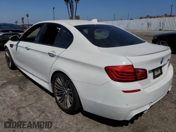 2014 BMW M5 with VIN WBSFV9C57ED097570, listed as a Copart auction lot 69757854 with 0 mi miles and Salvage Title. Bid and sale history available at carsss.com. Image 2.