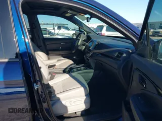 2023 Honda Passport Elite with VIN 5FNYF8H06PB012234, listed as a IAAI auction lot 41208146 with 38,491 mi miles and . Bid and sale history available at DreamBid. Image 5.