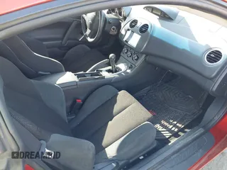2007 Mitsubishi Eclipse GS with VIN 4A3AK24FX7E013700, listed as a IAAI auction lot 41731979 with 71,490 mi miles. Bid and sale history available at carsss.com. Image 5.