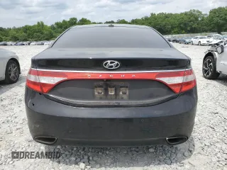 2012 Hyundai Azera с VIN KMHFH4JG7CA169397, выставлен на аукционе Copart как лот 55415055 с пробегом 138 207 миль миль и Списание • Salvage title. История ставок и продаж доступна на DreamBid. Изображение 6.