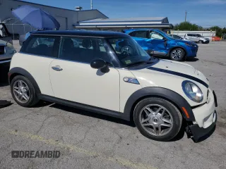 2009 MINI Hardtop S with VIN WMWMF73559TW83208, listed as a Copart auction lot 57347015 with 76,898 mi miles and Salvage title. Bid and sale history available at DreamBid. Image 4.