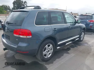 2005 Volkswagen Touareg 3.2L V6 with VIN WVGZG77L55D071024, listed as a IAAI auction lot 42111205 with 204,417 mi miles and . Bid and sale history available at DreamBid. Image 4.
