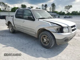 2002 Ford Explorer Sport Trac Value with VIN 1FMZU67E72UB31269, listed as a Copart auction lot 54994265 with 237,124 mi miles and Salvage title. Bid and sale history available at DreamBid. Image 4.