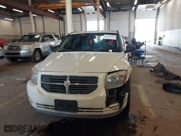 2009 Dodge Caliber SXT with VIN 1B3HB48A89D116734, listed as a IAAI auction lot 41959281 with 209,136 mi miles and . Bid and sale history available at DreamBid. Image 13.