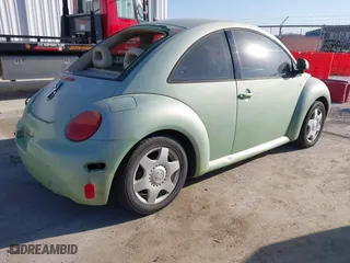2000 Volkswagen New Beetle GLS with VIN 3VWCA21C0YM403254, listed as a IAAI auction lot 41806878 with 119,547 mi miles. Bid and sale history available at carsss.com. Image 4.
