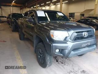 2014 Toyota Tacoma with VIN 3TMLU4EN9EM146494, listed as a IAAI auction lot 41920170 with 107,991 mi miles and . Bid and sale history available at DreamBid. Image 1.