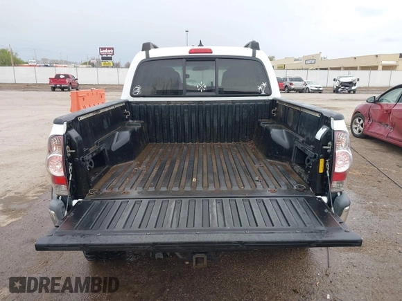 2014 Toyota Tacoma with VIN 3TMLU4EN8EM139665, listed as a IAAI auction lot 41925143 with 190,690 mi miles and . Bid and sale history available at DreamBid. Image 16.