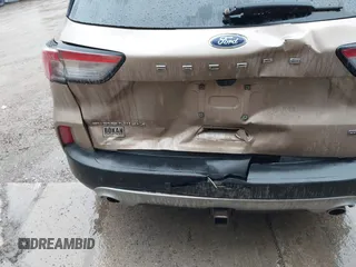 2021 Ford Escape Titanium Hybrid with VIN 1FMCU9DZXMUA66161, listed as a IAAI auction lot 41208651 with 61,198 mi miles and . Bid and sale history available at DreamBid. Image 6.