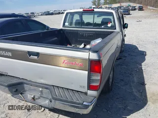 1998 Nissan Frontier XE with VIN 1N6DD26S5WC366647, listed as a IAAI auction lot 41833252 with 125,633 mi miles and . Bid and sale history available at DreamBid. Image 4.