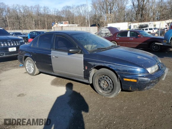 1999 Saturn SL with VIN 1G8ZK5270XZ184042, listed as a Copart auction lot 86827254 with Not Provided miles and Salvage Title. Bid and sale history available at carsss.com. Image 4.