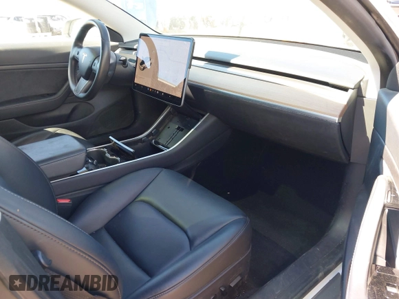 2020 Tesla Model 3 Standard Range Plus with VIN 5YJ3E1EA4LF644967, listed as a IAAI auction lot 41745984 with 23,479 mi miles and . Bid and sale history available at DreamBid. Image 5.