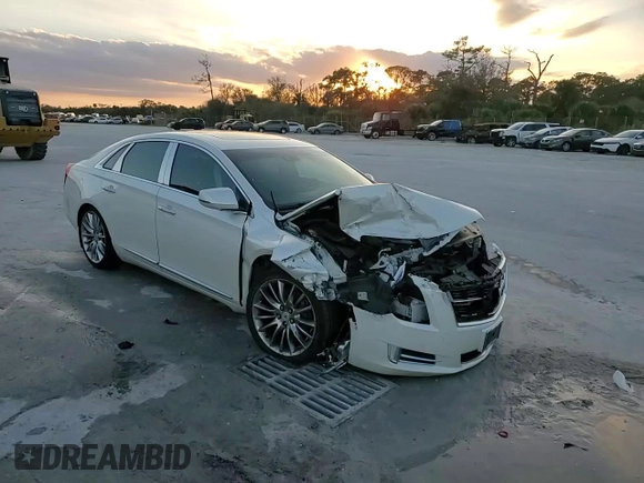 2014 Cadillac XTS Platinum z VIN 2G61W5S84E9153242, wystawiony jako Copart lot #88361685 z przebiegiem 141 401 mil mil oraz Szkoda całkowita • Salvage title. Historia ofert i sprzedaży dostępna na DreamBid. Obrazek 13.