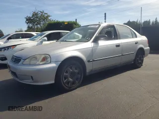 1999 Honda Civic LX z VIN 2HGEJ6675XH562090, wystawiony jako Copart lot #54111445 z przebiegiem 202 417 mil mil oraz Czysty tytuł • Clean title. Historia ofert i sprzedaży dostępna na DreamBid. Obrazek 1.