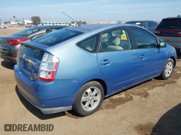 2006 Toyota Prius z VIN JTDKB20U063175034, wystawiony jako IAAI lot #42339383 z przebiegiem Nie podano mil oraz . Historia ofert i sprzedaży dostępna na DreamBid. Obrazek 4.