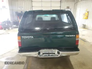 1999 Toyota Tacoma with VIN 4TANL42N4XZ453505, listed as a Copart auction lot 63399325 with 175,198 mi miles and Salvage title. Bid and sale history available at DreamBid. Image 6.