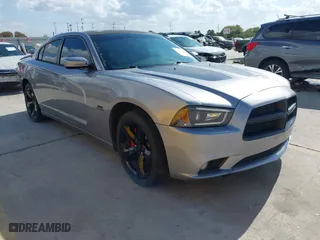 2014 Dodge Charger RT with VIN 2C3CDXCT5EH162939, listed as a IAAI auction lot 40706180 with 117,741 mi miles. Bid and sale history available at carsss.com. Image 1.