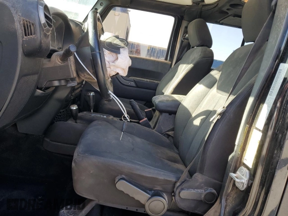 2018 Jeep Wrangler Unlimited Sport with VIN 1C4BJWDG4JL882001, listed as a Copart auction lot 51965055 with 132,836 mi miles and Salvage Title. Bid and sale history available at DreamBid. Image 7.