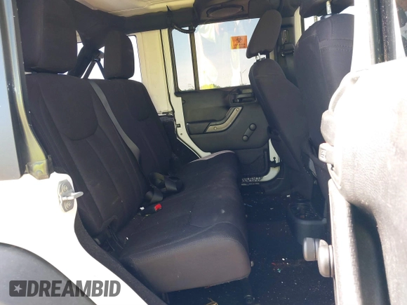 2013 Jeep Wrangler Unlimited Sport with VIN 1C4BJWDG4DL697208, listed as a IAAI auction lot 39507413 with 177,125 mi miles and . Bid and sale history available at DreamBid. Image 8.