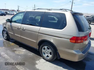 2001 Honda Odyssey EX z VIN 2HKRL18611H553161, wystawiony jako IAAI lot #42339181 z przebiegiem 89 235 mil mil oraz . Historia ofert i sprzedaży dostępna na DreamBid. Obrazek 3.
