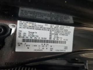 2015 Ford Focus Titanium с VIN 1FADP3J21FL254702, выставлен на аукционе Copart как лот 59872395 с пробегом 93 195 миль миль и Списание • Salvage title. История ставок и продаж доступна на DreamBid. Изображение 12.