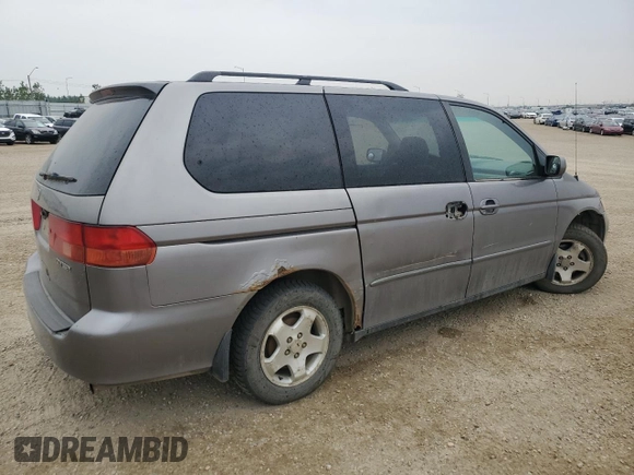 2000 Honda Odyssey EX z VIN 2HKRL186XYH010384, wystawiony jako Copart lot #60871845 z przebiegiem 423 167 mil mil oraz Czysty tytuł • Clean title. Historia ofert i sprzedaży dostępna na DreamBid. Obrazek 3.