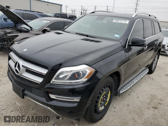 2015 Mercedes-Benz GL-Class GL 350 BlueTEC with VIN 4JGDF2EE2FA577062, listed as a Copart auction lot 69074112 with 59,566 mi miles. Bid and sale history available at carsss.com. Image 1.