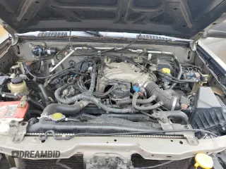 2004 Nissan Frontier XE Desert Runner z VIN 1N6ED26T84C448365, wystawiony jako Copart lot #56487435 z przebiegiem 266 738 mil mil oraz Tytuł czysty. Historia ofert i sprzedaży dostępna na DreamBid. Obrazek 11.