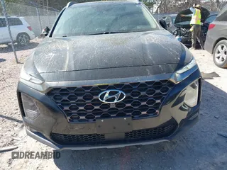 2019 Hyundai Santa Fe Ultimate with VIN 5NMS5CAA6KH075047, listed as a IAAI auction lot 41802407 with 119,063 mi miles and . Bid and sale history available at DreamBid. Image 12.