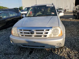 2004 Suzuki XL7 LX z VIN JS3TX92V044112500, wystawiony jako Copart lot #63123754 z przebiegiem 190 806 mil mil oraz Czysty tytuł • Clean title. Historia ofert i sprzedaży dostępna na DreamBid. Obrazek 5.
